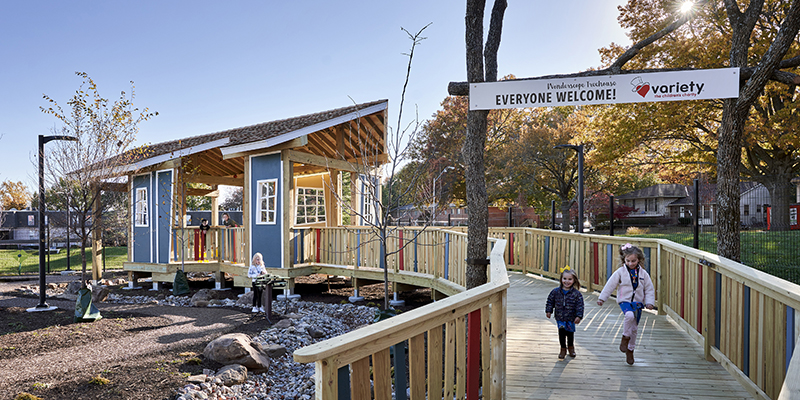 Two kids running outdoors at Wonderscope