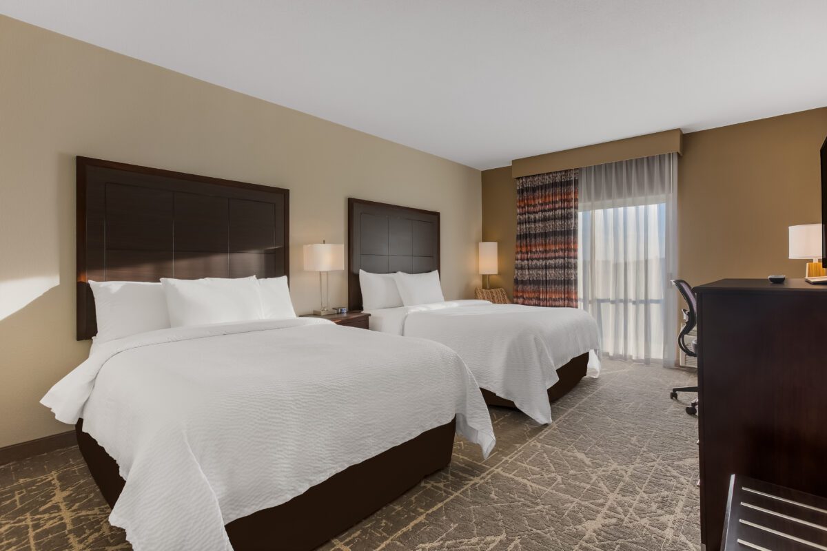 Orangewood Inn & Suites KCI – Logo_1 [LISTING]