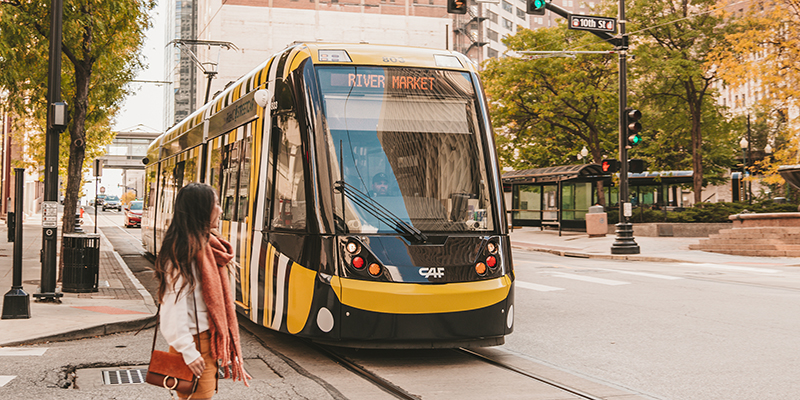 Woman watching KC Streetcar pass